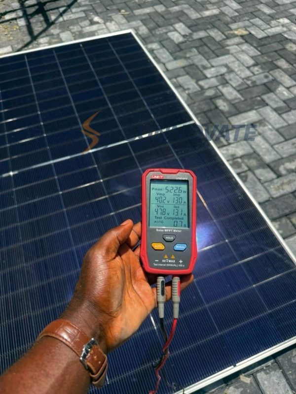 Sunnovate engineer testing solar panel voltage